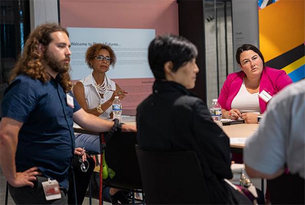 Team discusses AI's impact on cancer care and research.