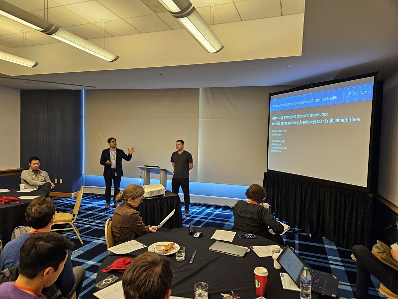 people presenting in a conference room