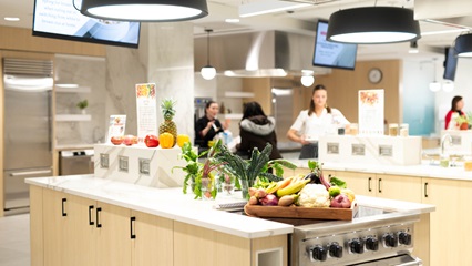 Fresh produce and culinary participants in the community learning kitchen