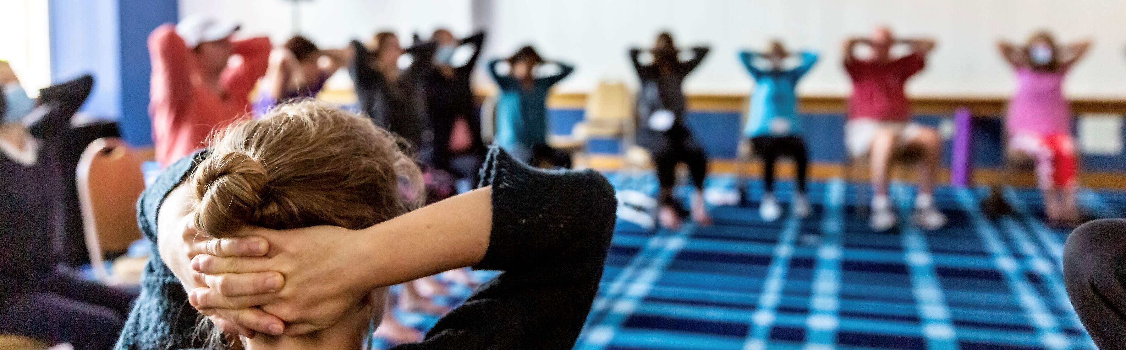optimize symposium group of people in meditative activity