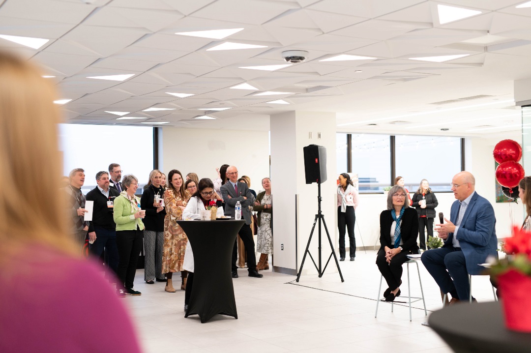 A group of people at an event watching a speaker at the Osher Wellness Suite