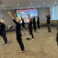 group of people doing tai chi