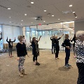 group of people doing tai chi
