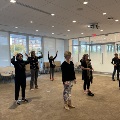 group of people doing tai chi
