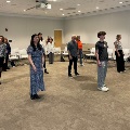 group of people listening to discussing on tai chi