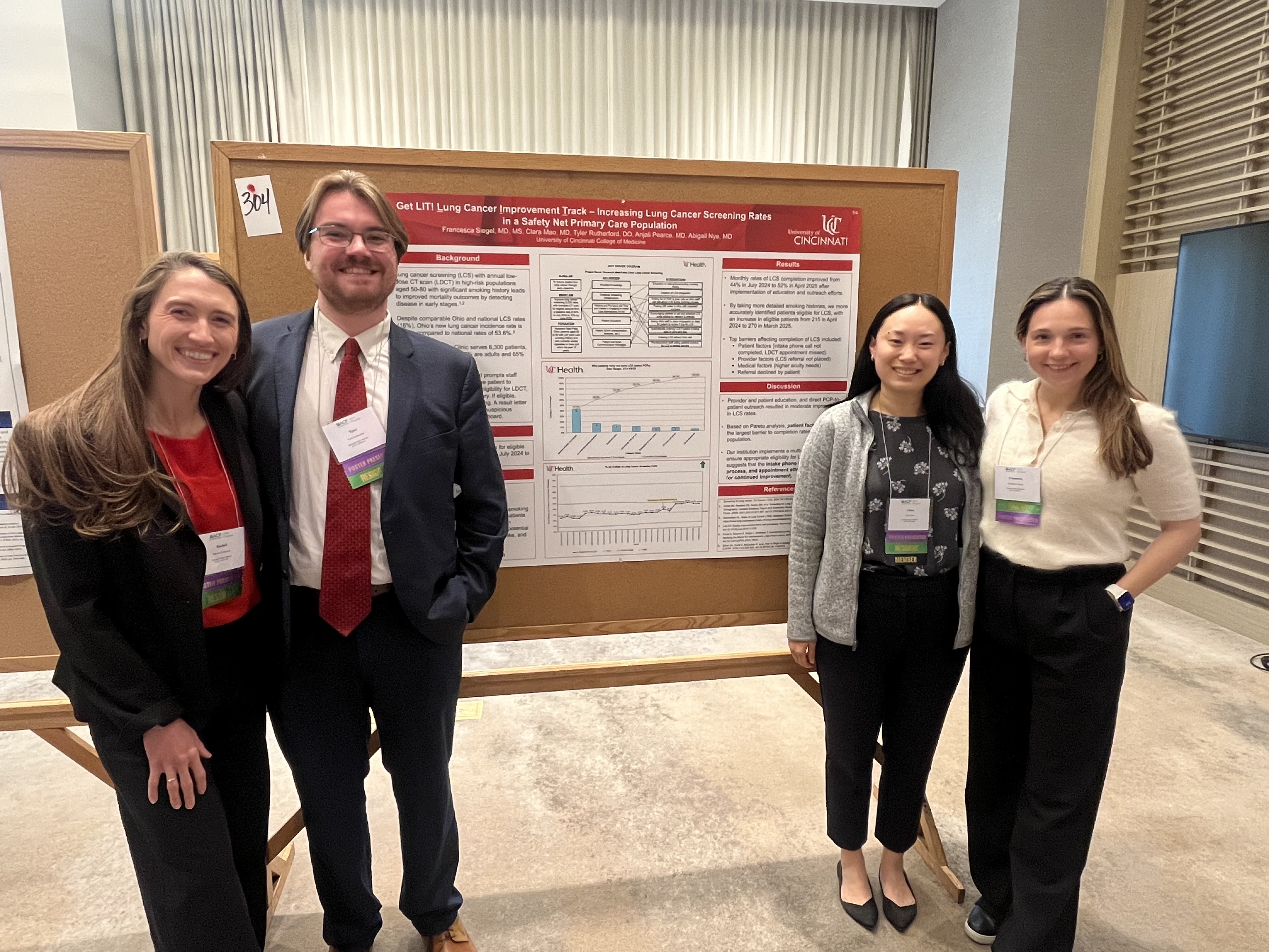 Residents presenting a lung cancer screening quality improvement project poster at Ohio ACP