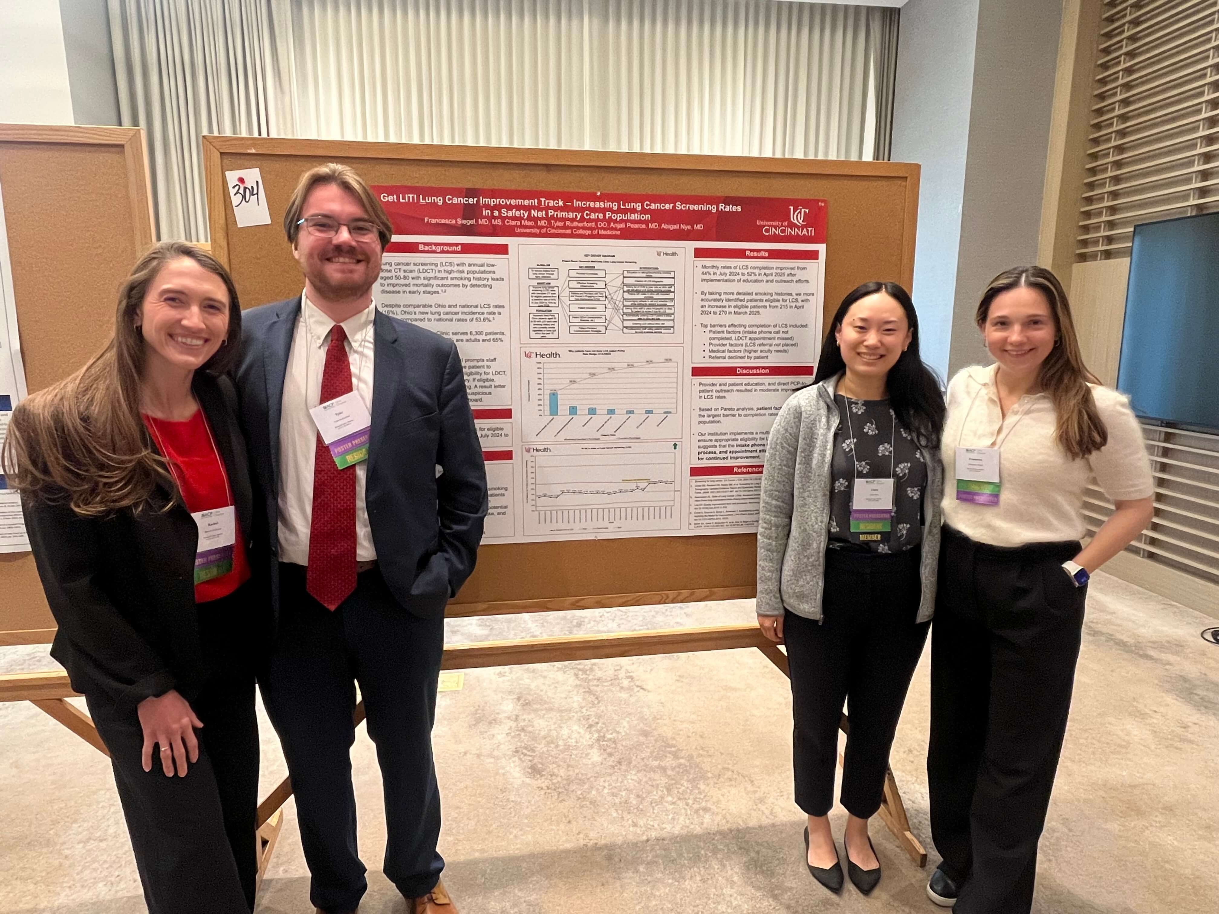 Residents presenting a lung cancer screening quality improvement project poster at Ohio ACP
