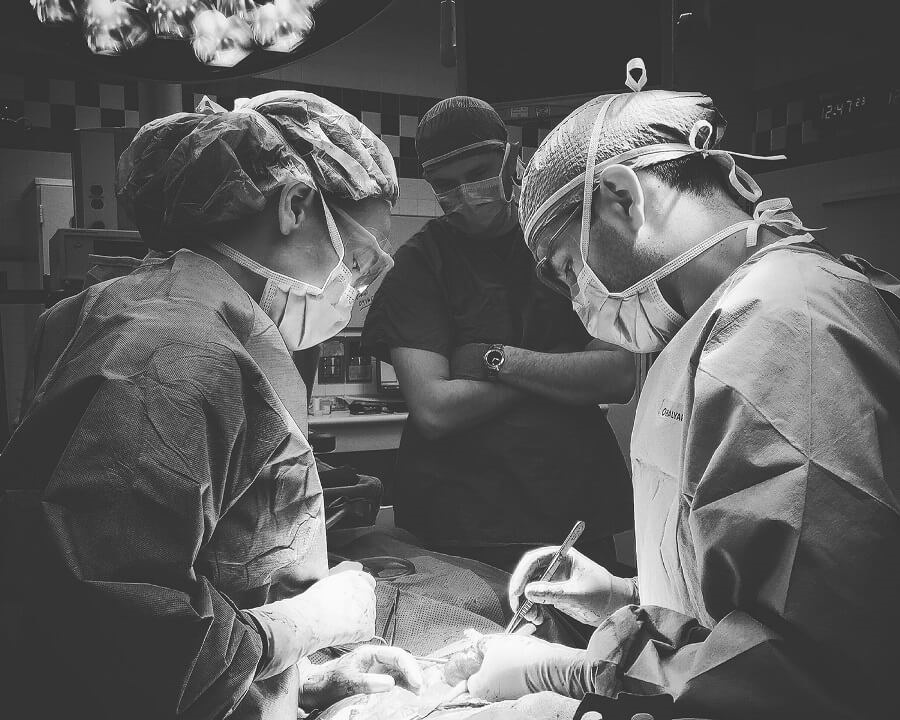 Doctors preforming a surgery